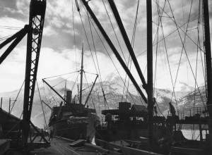Two ships docked in Skagway Harbor, a challenging task with the 20 foot tides. 1942